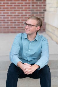 Person standing by wall