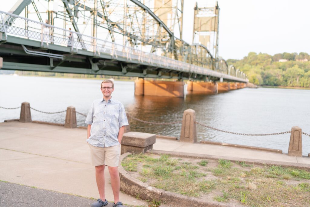 Person standing by bridge